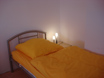 Blick auf das gemütliche Einzelbett